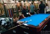 Paul McTier checks out a Schuler cue in the Jacoby booth - 2017 Billiard Congress of America Expo